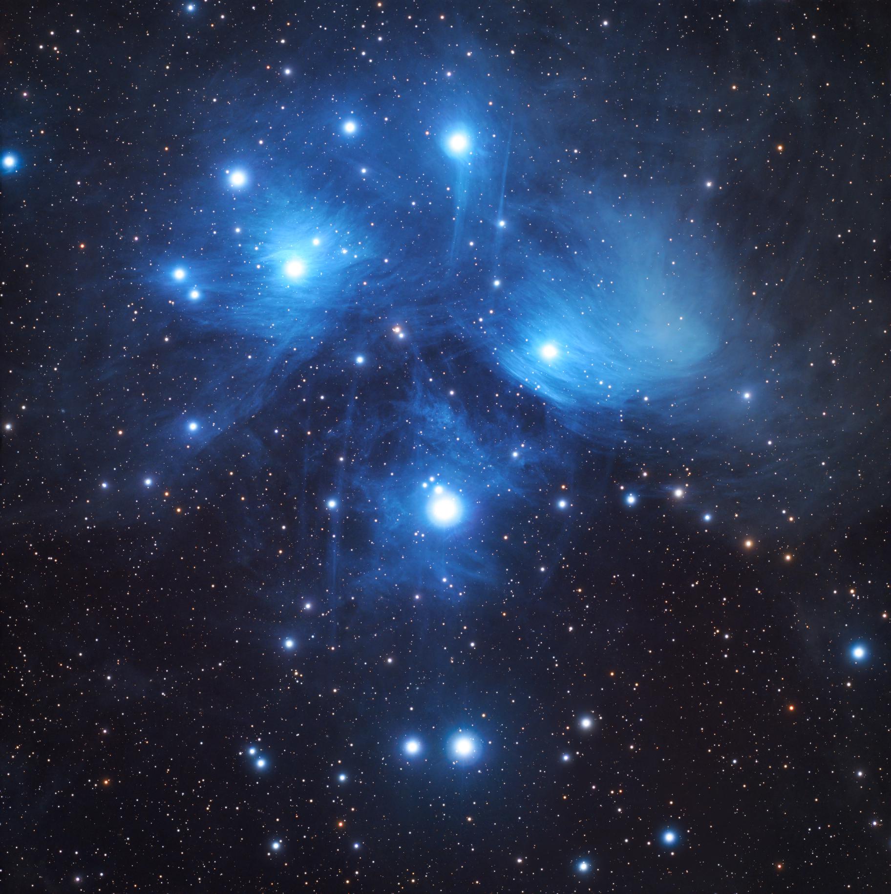 Pleiades M45 image showing blue reflection nebulosity around the bright Seven Sisters stars.