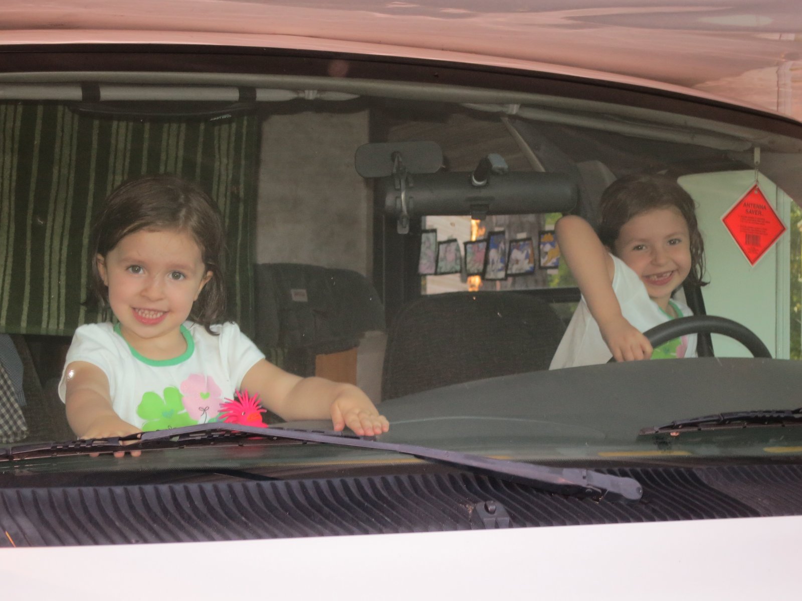 Kids sitting in the cab of the Tioga.